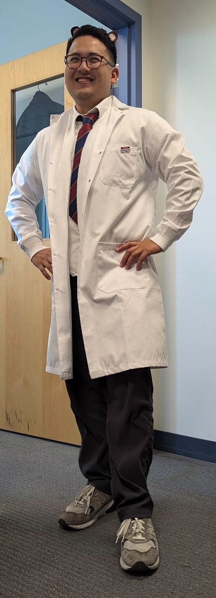 Eddie Looks so Professional in a Lab Coat